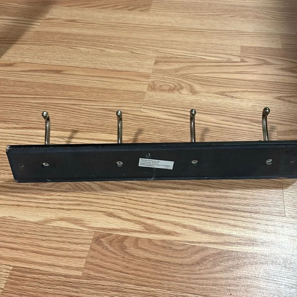 4 hooked wall coat, keys or purse rack- black and silver. Sturdy
